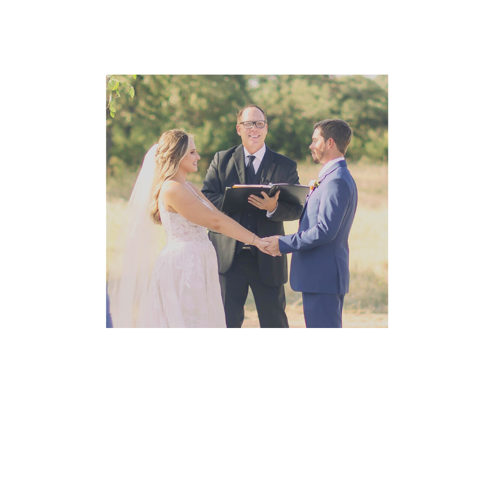 Reverend Tim Ball with Texas Wedding Ministers officiating during wedding ceremony while couple is smiling and holding hands