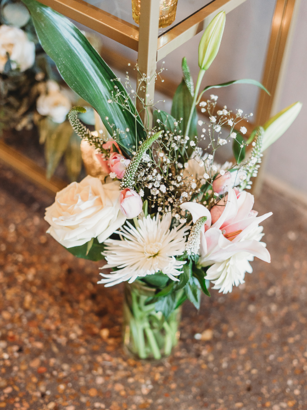 Texas Wedding Ministers couples' Bridal Flowers in a vase after wedding ceremony