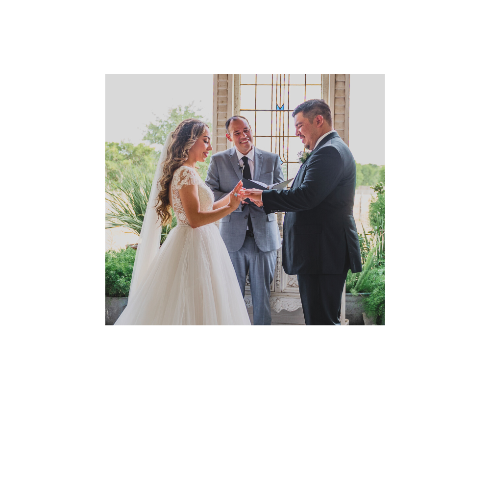 Wedding Officiant, Reverend Rene Esparza, with Texas Wedding Ministers, laughing with a couple during their wedding ceremony
